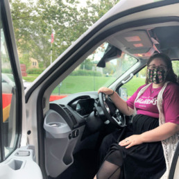 Lianna Tagle, Educational Outreach Coordinator at GRCM, in driver's seat.